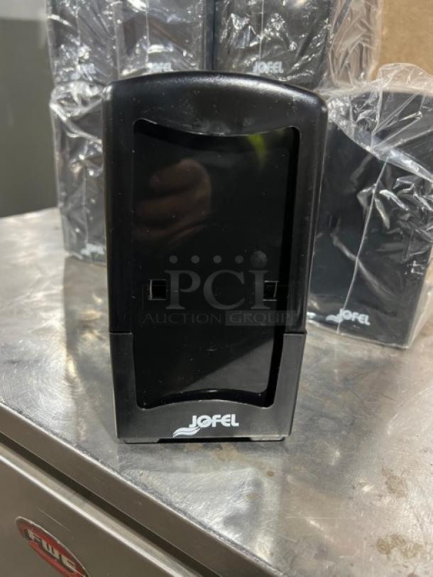 NEW Jofel black countertop tall-fold napkin dispenser, sleek design, marked with "Jofel" logo, ideal for commercial use.