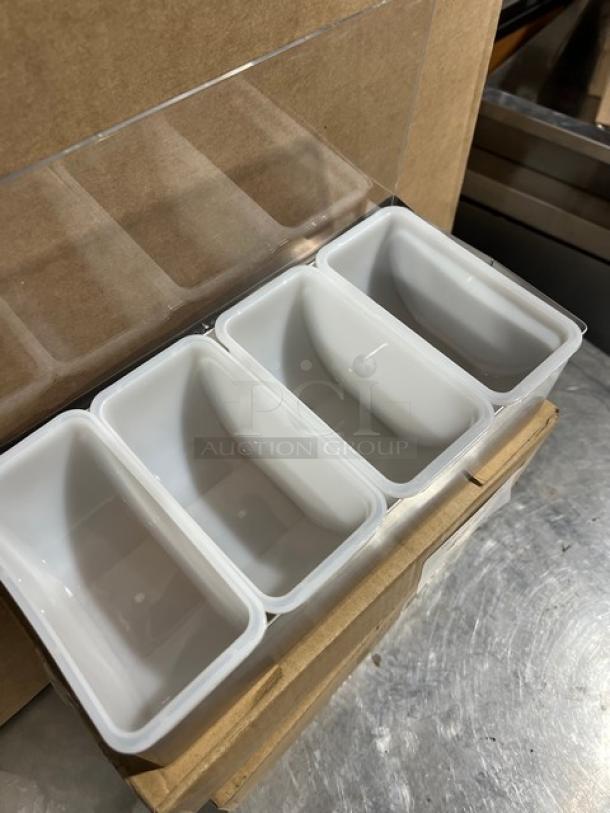 Adcraft SSCH-4 stainless steel condiment holder with 4 frost white polyethylene inserts, clear acrylic lid, new condition.