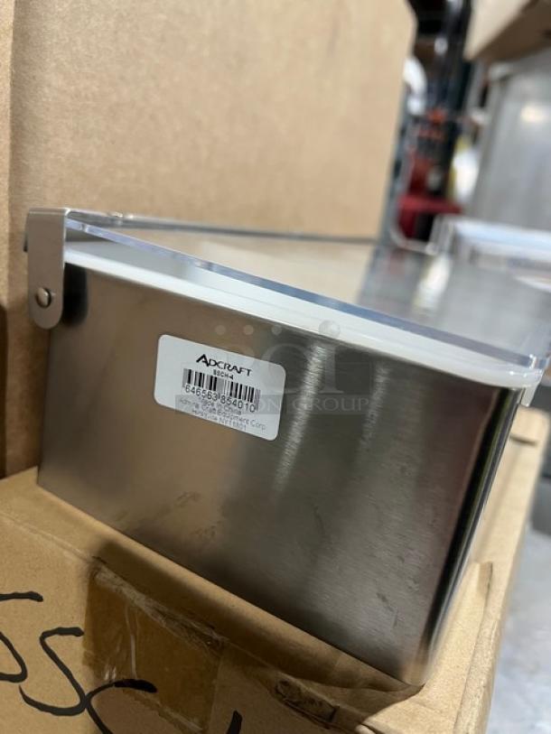 Adcraft SSCH-4 commercial stainless steel 4-compartment condiment holder with clear acrylic lid and white polyethylene inserts.