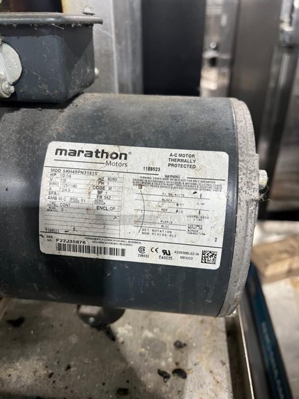 Southbend SL Series stainless steel gas convection oven, double stacked, wired racks, on casters. Features Marathon motor.