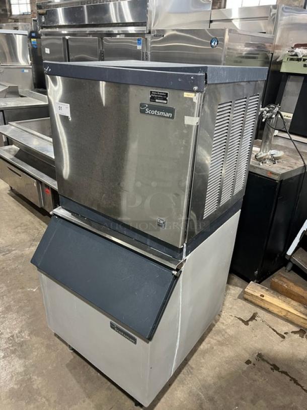 Scotsman commercial stainless steel ice maker, model CME256AS-1H, air-cooled, 115V, on legs, used condition.