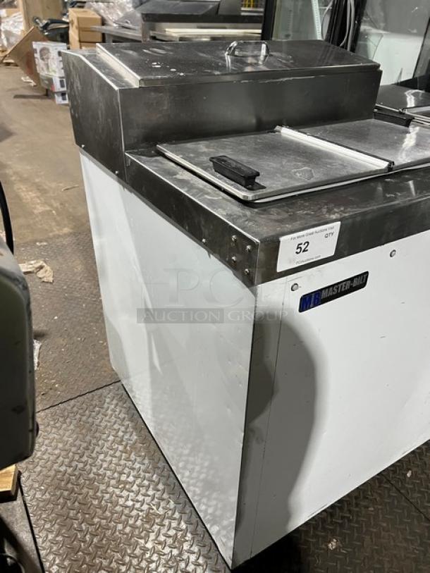 Master-Bilt FLR60 ice cream topping unit with refrigerated base, 115V, 1 phase, on casters; features stainless steel top.