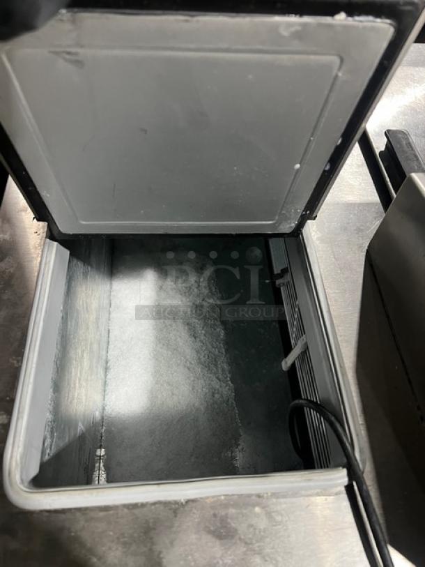 Master-Bilt FLR60 ice cream topping unit with refrigerated base, interior view, 115V, on casters, SN: 31169-C-011.