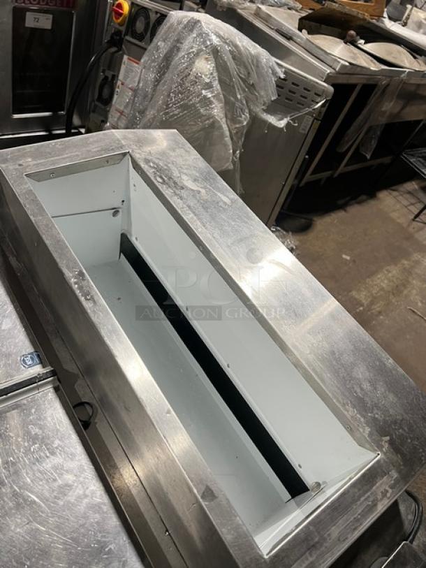 Master-Bilt FLR-60 ice cream topping unit with refrigerated base, stainless steel finish, on casters, 115V 1 phase.