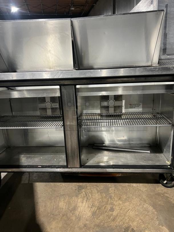 True TSSU-60-24M-B-ST-HC refrigerated bain marie prep table, stainless steel, 2 doors, wired racks, on casters, 115V.