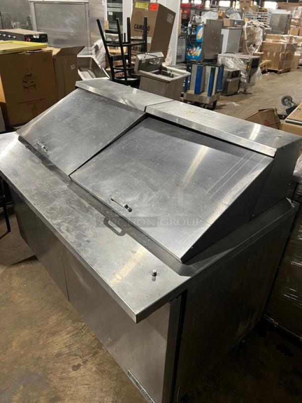 True commercial stainless steel 2-door refrigerated bain-marie prep table, Model TSSU-60-24M-B-ST-HC, on casters.