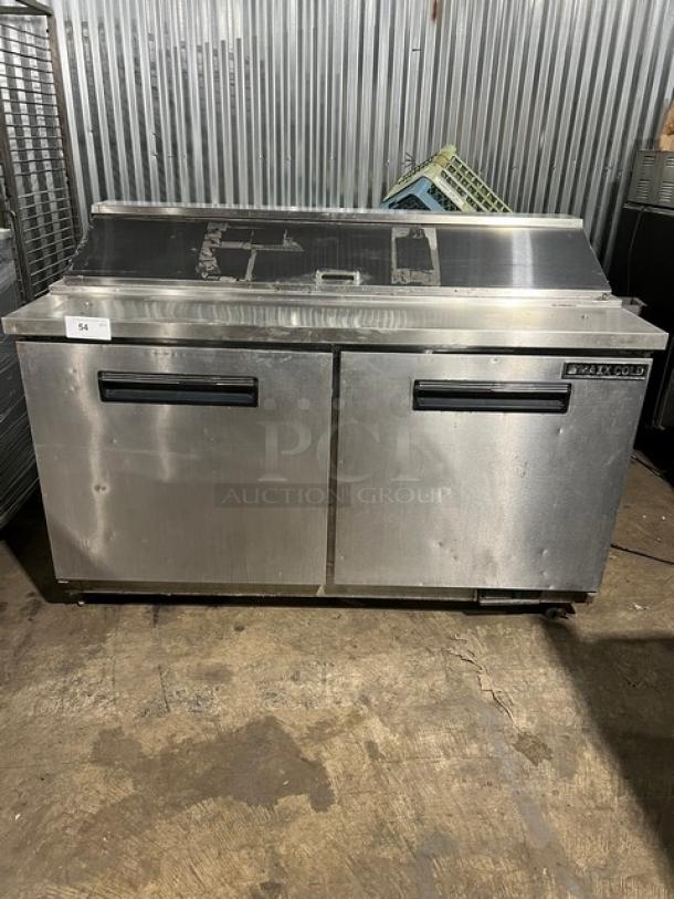 Maxx Cold stainless steel refrigerated bain marie prep table, Model MXCR60S. Features include poly coated wired rack, casters, and two doors. 115V, 1 Phase, used condition.