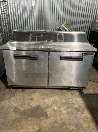 Maxx Cold stainless steel refrigerated bain marie prep table, Model MXCR60S. Features include poly coated wired rack, casters, and two doors. 115V, 1 Phase, used condition.