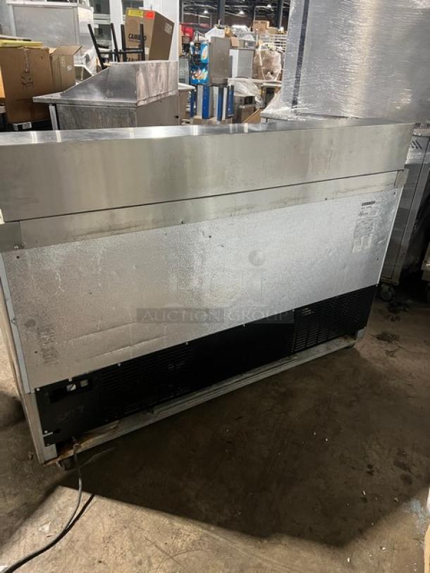 Maxx Cold stainless steel refrigerated prep table, model MXCR60S, with poly-coated wire rack, on casters; SN: 6070834.