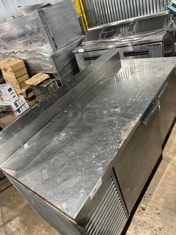 Commercial stainless steel 2-door refrigerated pizza prep table, Model 51268AM, on legs, 115V, 1 phase, SN: W00000028197.