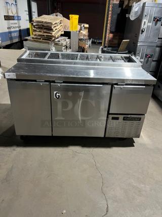 Continental CPA60 stainless steel refrigerated pizza prep table with wired rack, 115V, on casters, model SN: 155C1556.