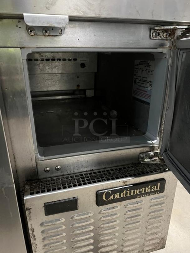 Continental CPA60 stainless steel refrigerated pizza prep table, wired rack, on casters, 115V 1 phase, model label visible.