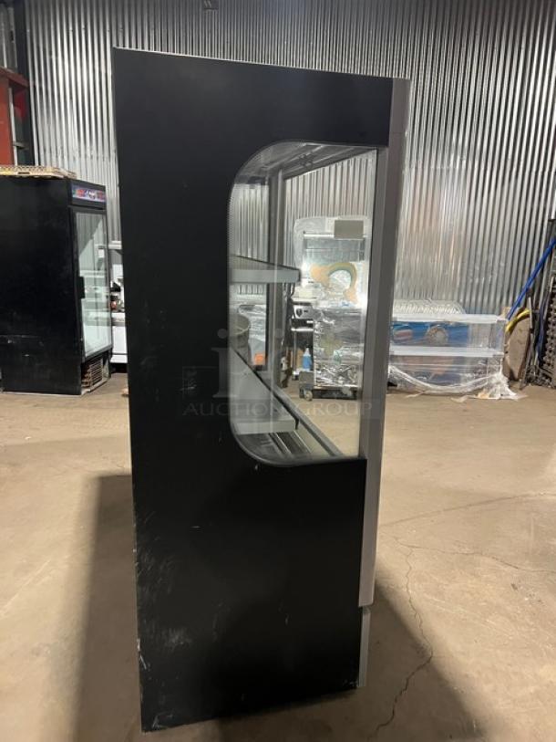 Beverage-Air VM18 black refrigerated open merchandiser with pull-down curtain, adjustable shelves, 120V, 1 phase, serial 0721176-36481-U.