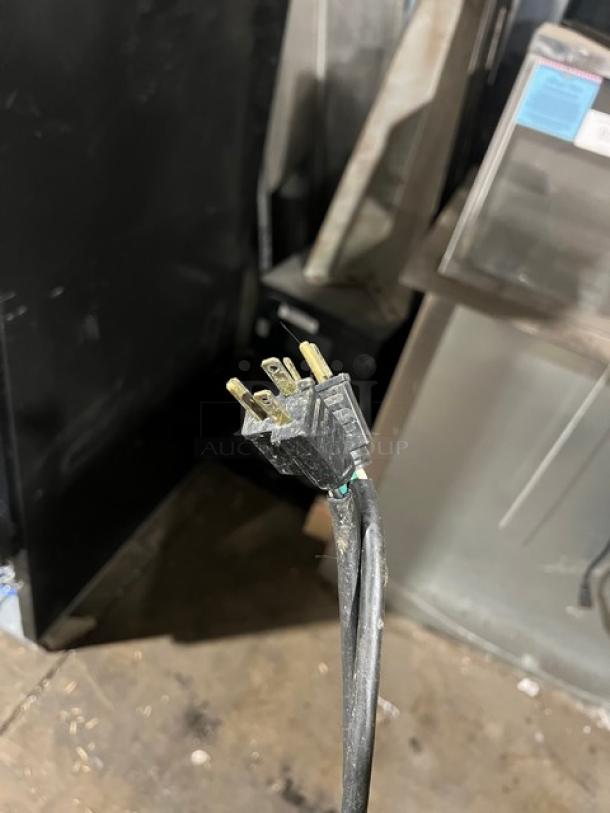 Plug of Vulcan commercial stainless steel electric double-stacked convection oven, showing power connector detail.