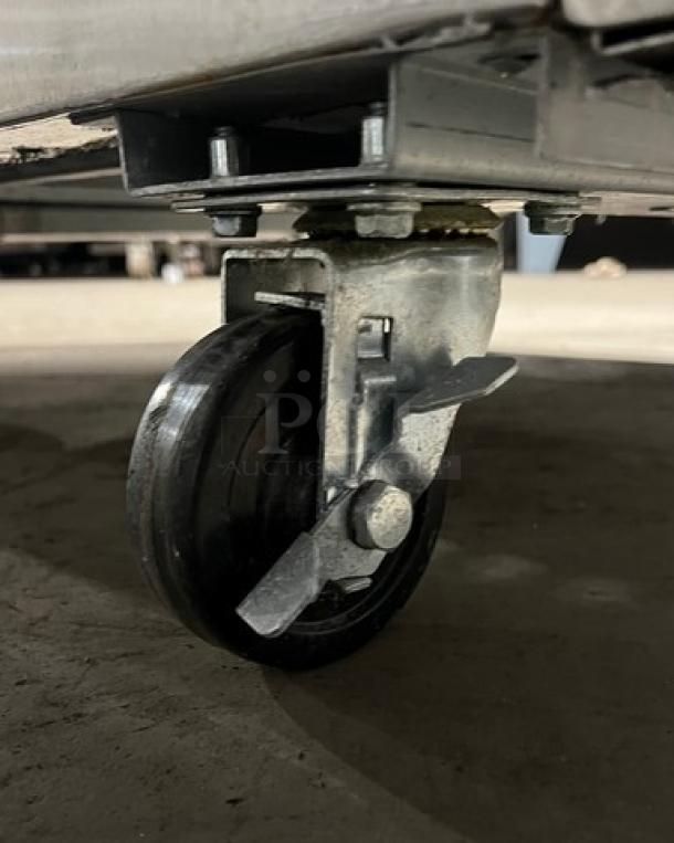 Avantco CFD Series reach-in freezer caster detail, model 178CFD1FF, stainless steel, poly coated rack, serial 6375170216040387.