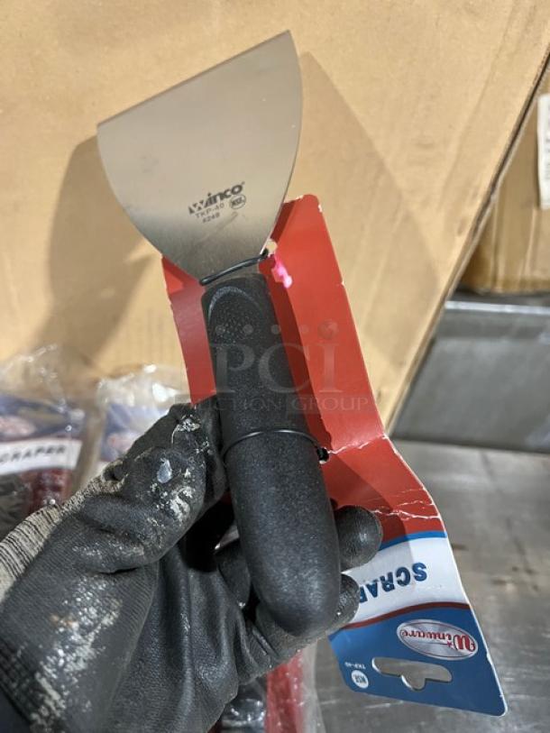 Winco Winware Series stainless steel handheld scraper, model TKP-40, new with black slip-resistant polypropylene handle.
