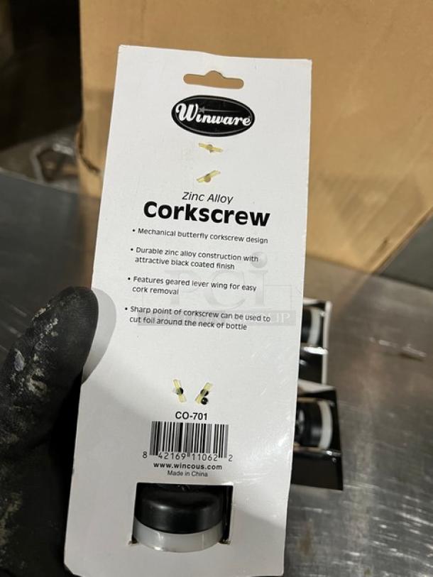 Winco Winware Series CO-701 corkscrew, new in package. Zinc alloy, butterfly design, black coated finish, mechanical lever.