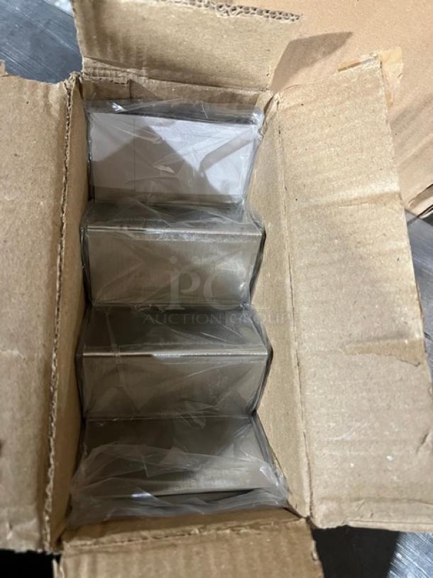 Winco stainless steel 2-3 slot taco holder, Model TCHS-23, new in box. Durable commercial-grade design.