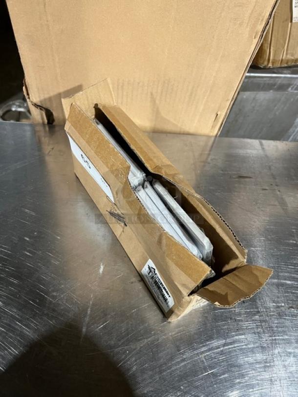 Winco TBN25 tabletop placard set, numbers 1-25, in open box. New condition, visible model label on cardboard packaging.