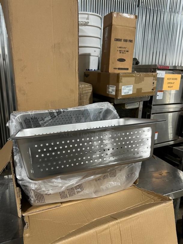 New Winco SPFP6 stainless steel perforated steam table pan, full-size, 6" deep, in pristine condition, displayed with packaging.