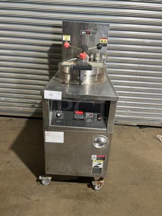 BKI 2015 LPF-F commercial stainless steel pressure fryer, electric, color-keyed locking spindle, lid-lock system, on casters.