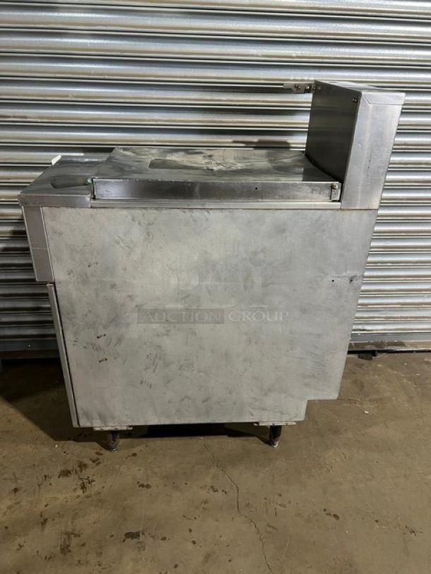 Pitco SRTE commercial stainless steel electric pasta cooker with 16.5-gallon capacity, digital control, and backsplash, on legs.