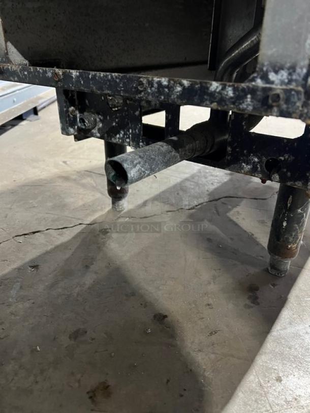 Close-up of the Pitco SRTE stainless steel electric pasta cooker/rethermalizer on legs, showing the base and drainage pipe.