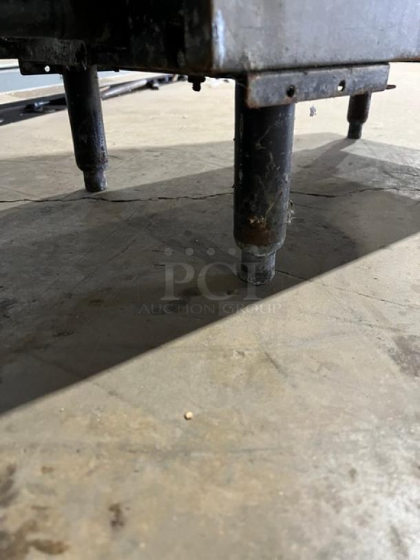 Pitco SRTE commercial pasta cooker legs detail, highlighting sturdy construction. Electric, 208V, 1 Phase, with digital control.