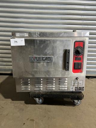 Vulcan C24EA3 stainless steel countertop 3-pan convection steamer, electric-powered, with built-in pan rack, on casters.