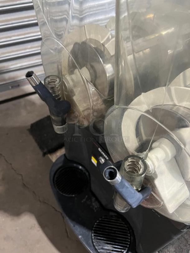 Bunn Granita Series twin slushy machine, Model CDS2, with two 3-gal. hoppers, drip tray, and stainless steel build.