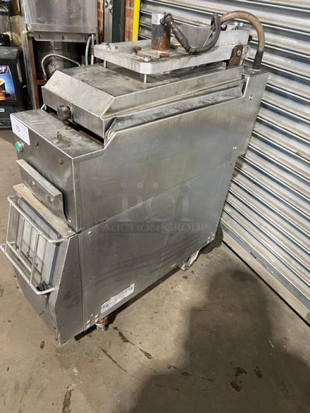 Garland CXBE12 stainless steel electric hamburger press, dual-side broiler, wavy grates, 208V 3 phase, on casters, used.