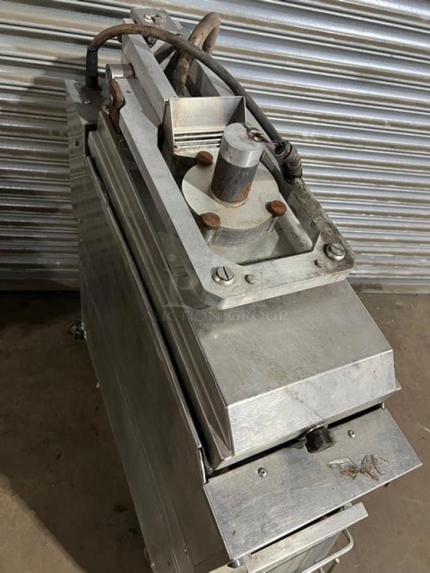 Garland CXBE12 stainless steel electric hamburger press with wavy grates. Dual-side broiler on casters. Model/SN: 1310100102395.