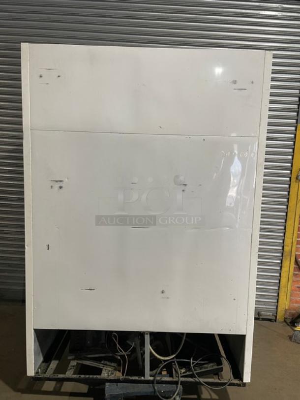 True GDM-49 double glass swing door merchandiser refrigerator, Energy Star certified, with poly coated racks, beverage organizers.