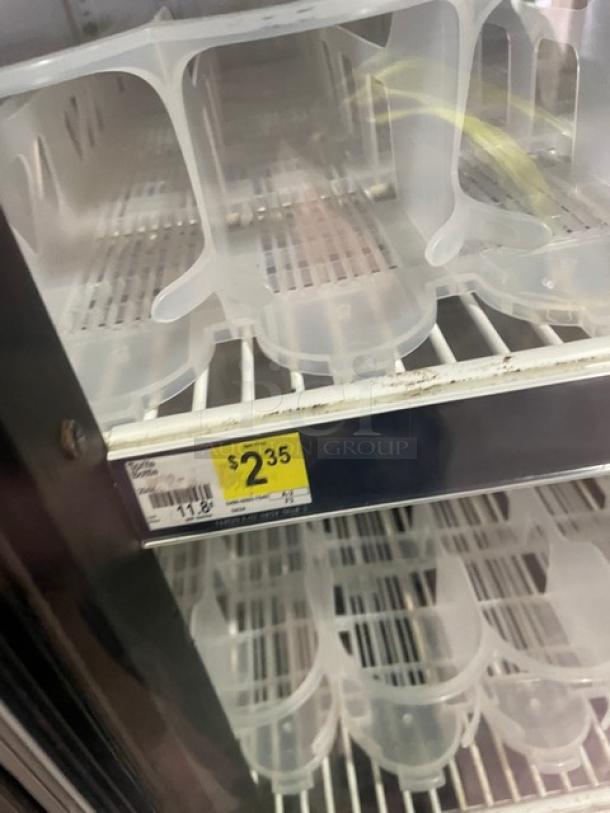 True GDM-49 Merchandiser Refrigerator; double glass swing doors, poly-coated wired rack, beverage organizers, Energy Star certified.