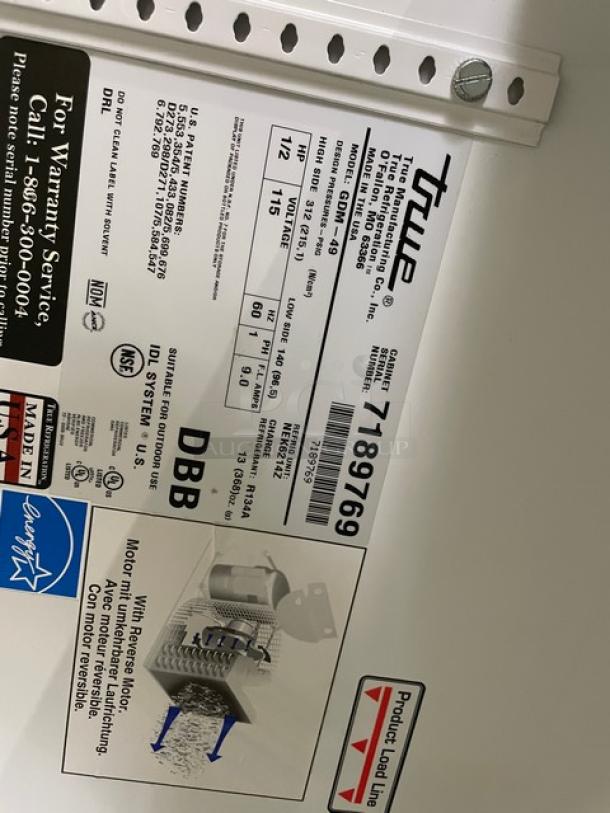 True Commercial Refrigerator, model GDM-49, SN 7189769, Energy Star certified, with poly-coated rack and beverage organizers.