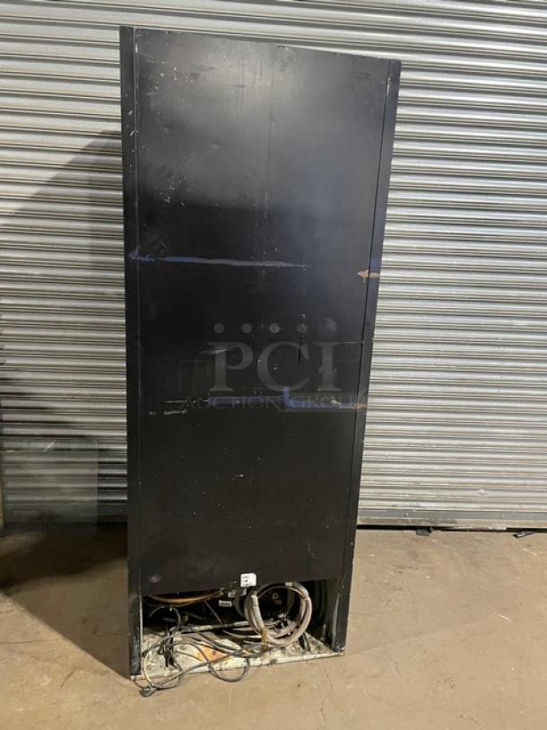 Beverage-Air MT27 commercial refrigerator, black, single glass swing door, poly coated wire rack, model MT27, SN 7685020, 115V.