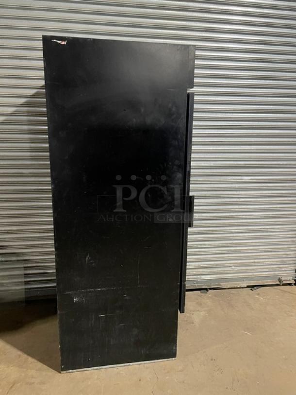 Beverage-Air MT27 commercial black reach-in merchandiser refrigerator with single glass swing door, model MT27, 115V, used condition.