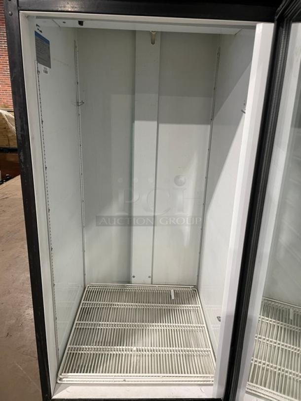 Beverage-Air MT27 commercial black glass swing door refrigerator with poly-coated rack, model SN:7685020, 115V 1 phase.