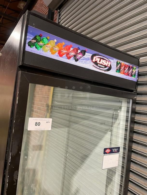 Beverage-Air MT27 commercial glass door refrigerator, black with poly coated rack, model SN: 7685020, 115V, 1 phase, in used condition.
