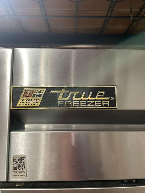 True T49F Commercial Stainless Steel 2 Door Reach-In Freezer, Energy Star Certified, with poly-coated rack, on casters.
