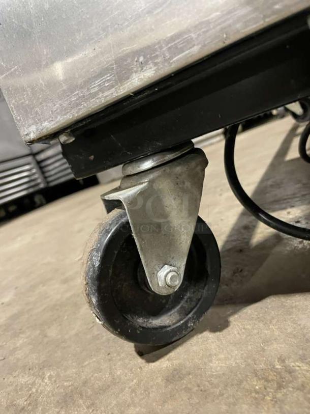 True T-49F stainless steel reach-in freezer on caster wheels, solid two-door, Energy Star certified, model T49F.