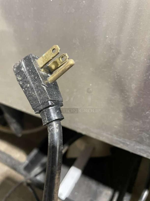 True T-49F stainless steel 2-door commercial freezer on casters, Energy Star certified, with poly-coated wire rack, 115V 1 phase.