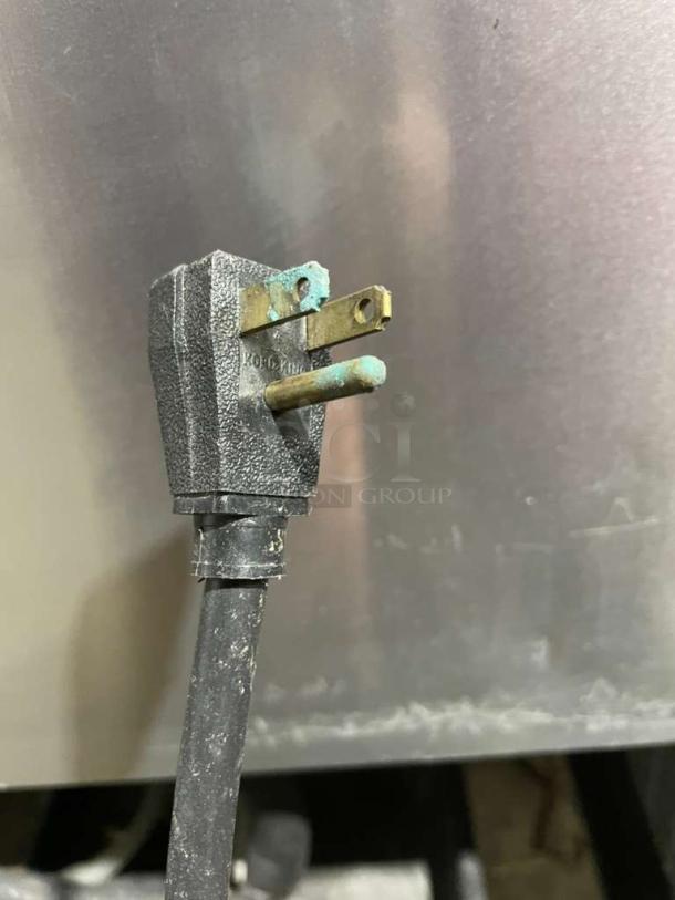 True Commercial Stainless Steel 2-Door Reach-In Freezer, Model T-49F, Energy Star, poly coated racks, on casters, 115V.