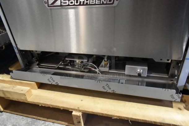 New Southbend 4601DD stainless steel commercial range with 10 burners, 2 ovens, and backsplash, natural gas-powered.