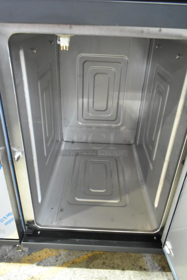 Brand new Alto Shaam 1200-TH stainless steel commercial Halo Heat oven interior, full height, on casters, 208-240V, 1 phase.