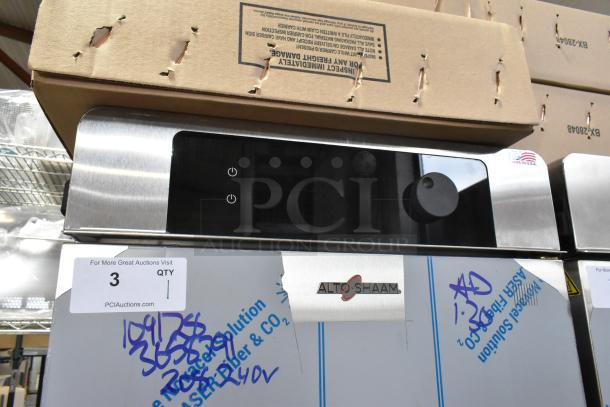Brand new 2025 Alto Shaam 1200-TH stainless steel cook and hold oven, commercial casters, 208-240V, 1 phase, tags visible.
