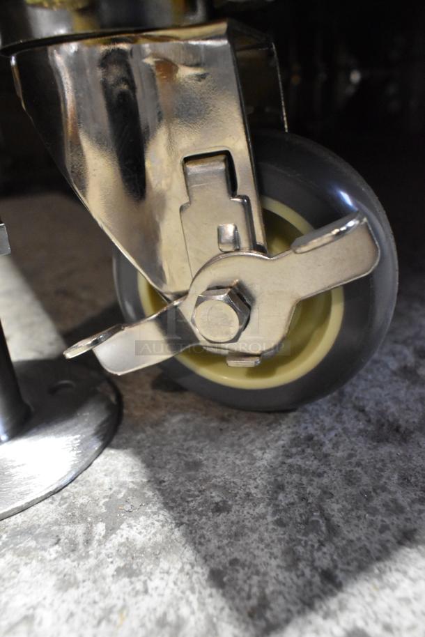 Stainless steel caster wheel of a 2025 Alto Shaam 1200-TH Halo Heat oven. Brand new, on commercial casters.