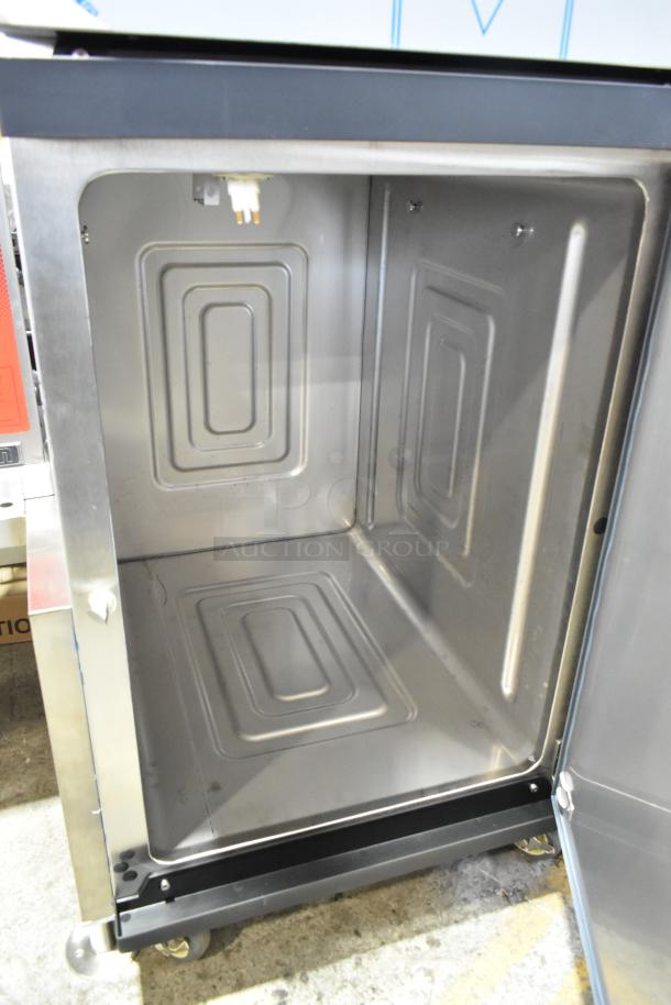 Stainless steel Alto Shaam 1200-TH Halo Heat® Cook and Hold Oven, new, on commercial casters, 208-240V, 1 phase.