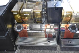 Thermoplan Mastrena II Stainless Steel Espresso Machine with steam wand, control panel, and labeled hoppers: decaf, signature, blonde.