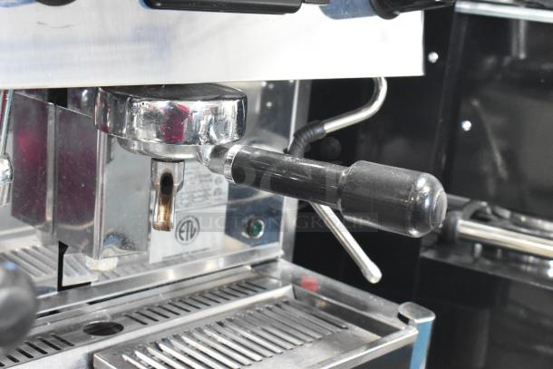 Grimac VD2GE stainless steel commercial espresso machine with 3 portafilters, 2 steam wands. ETL label visible. 220V, 1 phase.